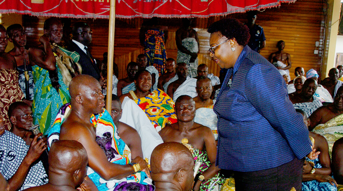  Mrs Christiana Ekaeta Olaoye  (right) standing  before the Otumfuo Osei Tutu, the Asantehene